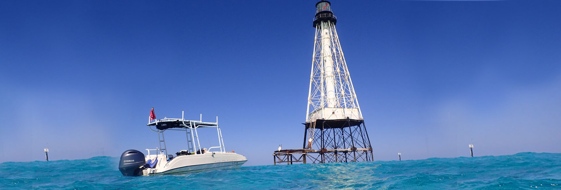 Captain beside tour boat in Islamorada